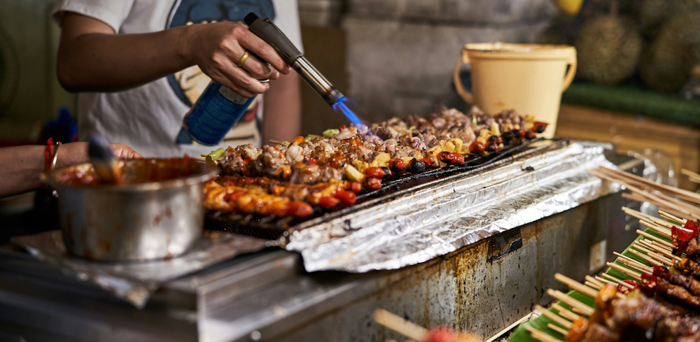 Barbecue Food Stall in Bangkok by Norbert Braun on Unsplash