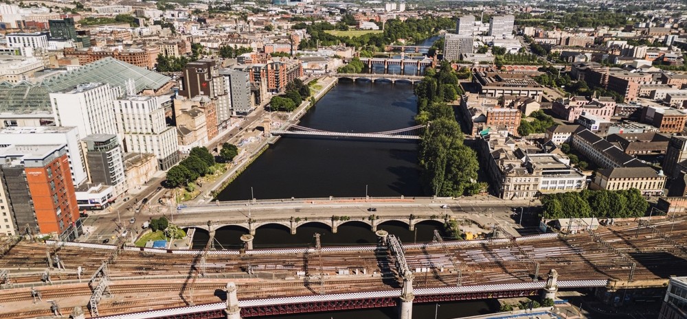 Glasgow cityscape with river and bridges