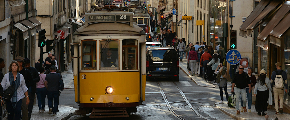 Tram in Alfama, Lisbon, by Jacek Urbanski on Unsplash