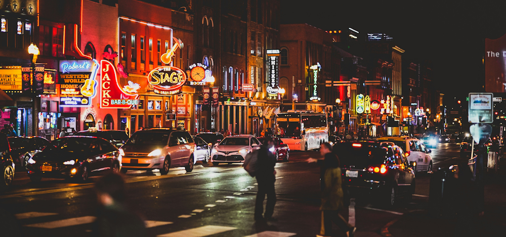 Neon-Lit Broadway Street At Night In Nashville by Cameron Stewart on Unsplash