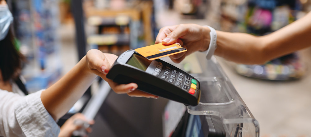 tapping a credit card on a card reader